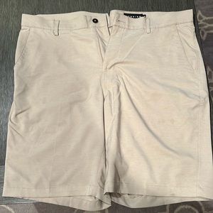 Khaki colored golf shorts with stretch